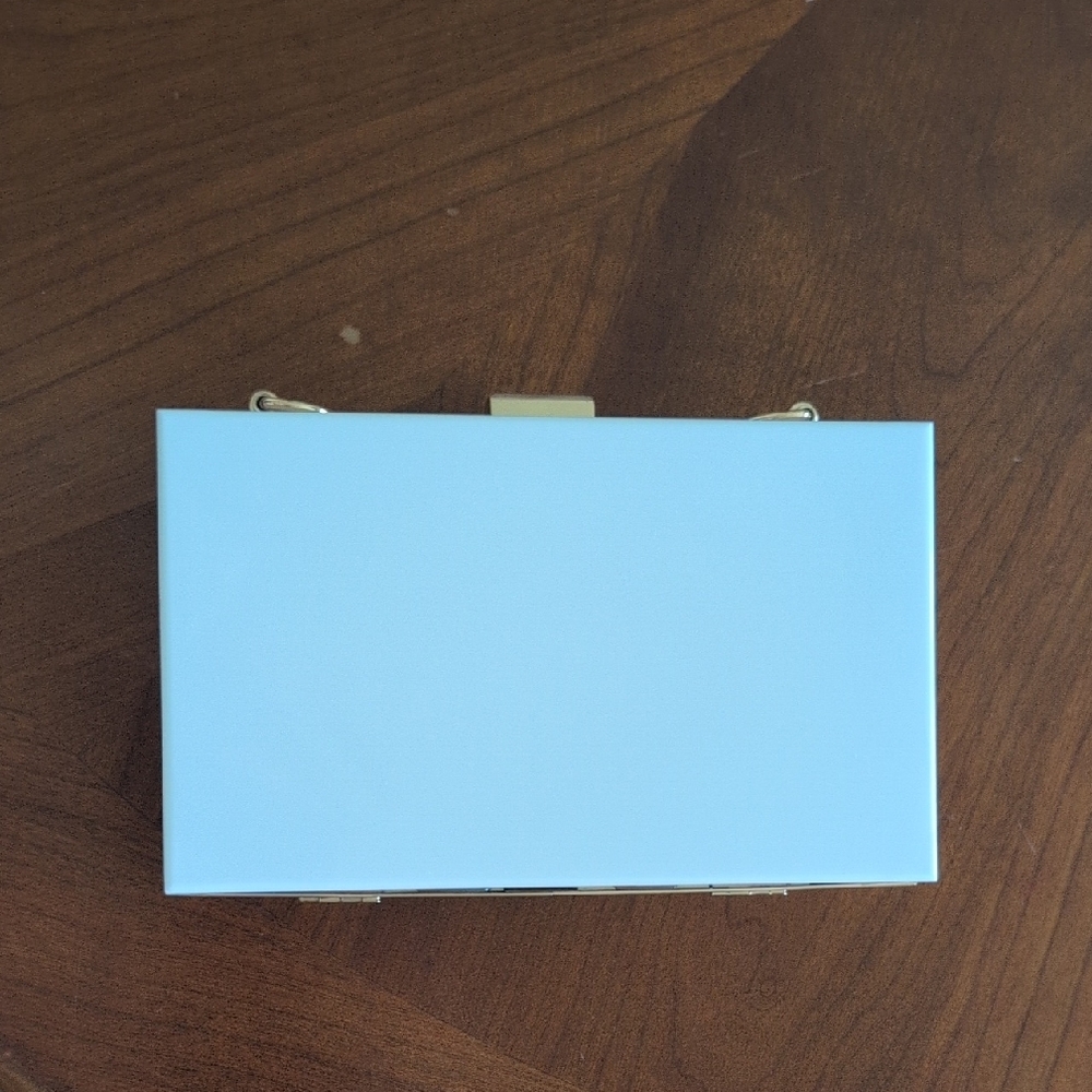 Elegant White Clutch With Gold Chain